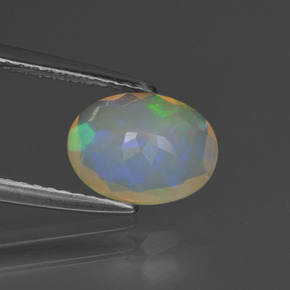 Ópalo multicolor natural de 1,02 ct, corte óvalo, transparente