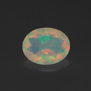 Ópalo multicolor natural de 1,09 ct, corte óvalo, transparente