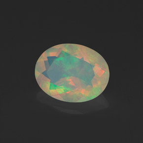 Ópalo multicolor natural de 1,09 ct, corte óvalo, transparente