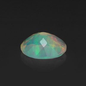 Ópalo multicolor natural de 1,18 ct, corte óvalo, transparente