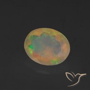Ópalo Multicolor natural de 1.07 ct, Ovalada, Transparente