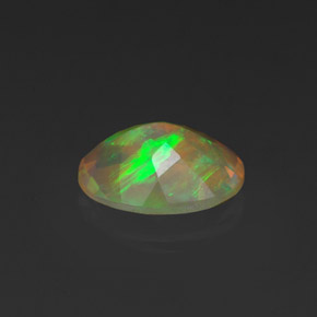 Ópalo multicolor natural de 0,96 ct, corte óvalo, transparente