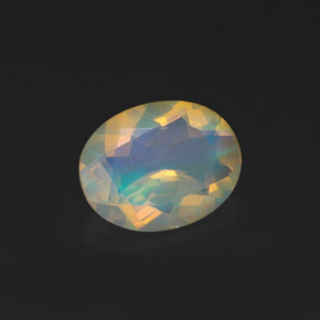 Ópalo multicolor natural de 0,99 ct, corte óvalo, transparente
