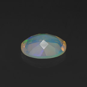 Ópalo multicolor natural de 0,99 ct, corte óvalo, transparente