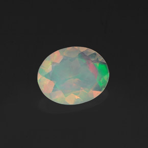 Ópalo multicolor natural de 0,75 ct, corte óvalo, transparente