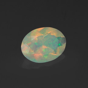 Ópalo multicolor natural de 0,91 ct, corte óvalo, transparente