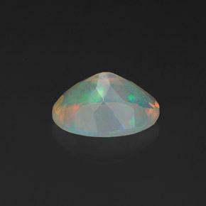 Ópalo multicolor natural de 1,08 ct, corte óvalo, transparente