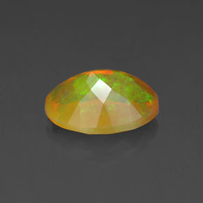Ópalo multicolor natural de 1,21 ct, corte óvalo, transparente