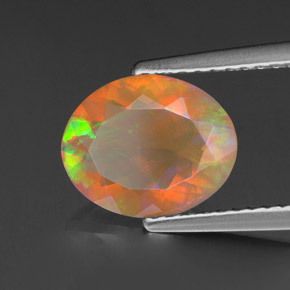 Ópalo multicolor natural de 1,45 ct, corte óvalo, transparente
