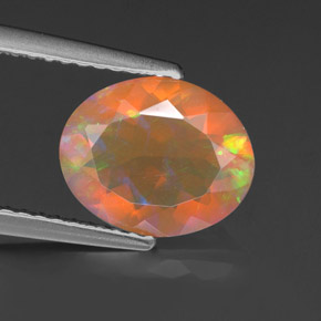 Ópalo multicolor natural de 1,45 ct, corte óvalo, transparente