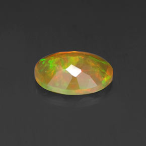 Ópalo multicolor natural de 0,69 ct, corte óvalo, transparente