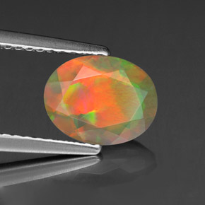 Ópalo multicolor natural de 1,11 ct, corte óvalo, transparente