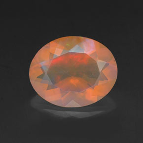 Ópalo multicolor natural de 1,40 ct, corte óvalo, transparente