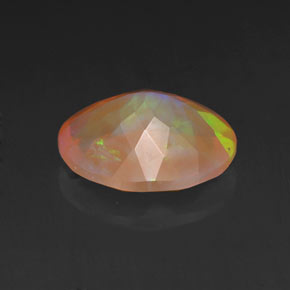 Ópalo multicolor natural de 1,40 ct, corte óvalo, transparente