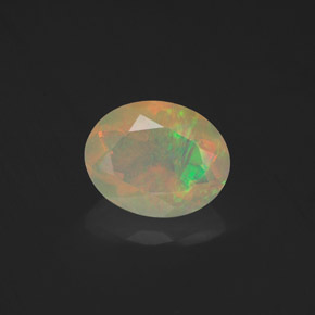 Ópalo multicolor natural de 1,23 ct, corte óvalo, transparente