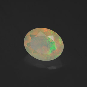 Ópalo multicolor natural de 1,23 ct, corte óvalo, transparente