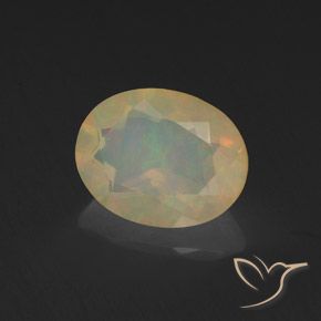Ópalo Multicolor natural de 1.02 ct, Ovalada, Transparente