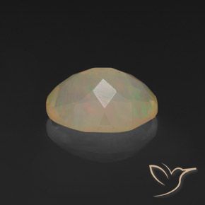 Ópalo Multicolor natural de 1.02 ct, Ovalada, Transparente