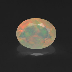 Ópalo multicolor natural de 1,14 ct, corte óvalo, transparente