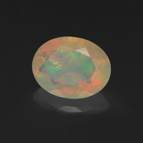 Ópalo multicolor natural de 1,14 ct, corte óvalo, transparente