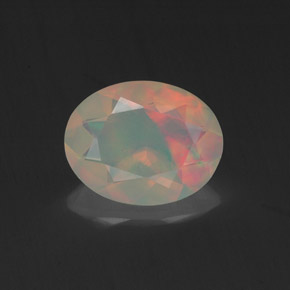 Ópalo multicolor natural de 0,96 ct, corte óvalo, transparente
