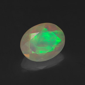 Ópalo multicolor natural de 1,06 ct, corte óvalo, transparente