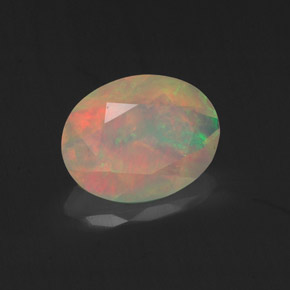 Ópalo multicolor natural de 1,04 ct, corte óvalo, transparente