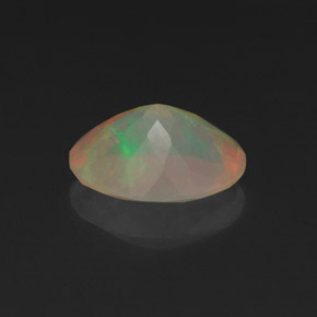 Ópalo multicolor natural de 1,04 ct, corte óvalo, transparente