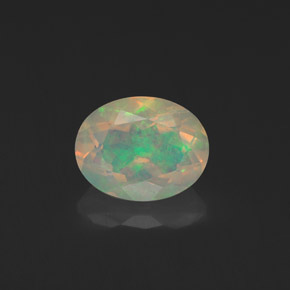 Ópalo multicolor natural de 1,29 ct, corte óvalo, transparente