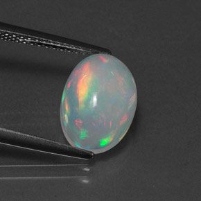 Ópalo multicolor natural de 2,46 ct, corte óvalo, transparente