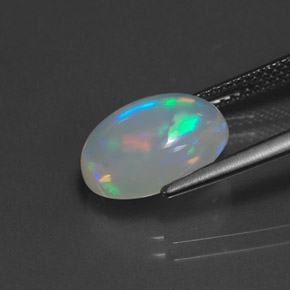 Ópalo multicolor natural de 2,90 ct, corte óvalo, transparente