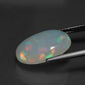 Ópalo multicolor natural de 3,97 ct, corte óvalo, transparente