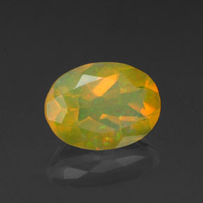Ópalo multicolor natural de 0,98 ct, corte óvalo, transparente