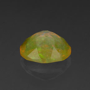 Ópalo multicolor natural de 0,98 ct, corte óvalo, transparente