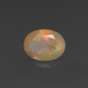 Ópalo multicolor natural de 0,88 ct, corte óvalo, transparente