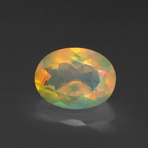Ópalo multicolor natural de 0,95 ct, corte óvalo, transparente