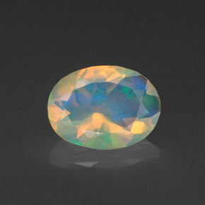 Ópalo Multicolor natural de 0.72 ct, Corte Óvalo, Transparente