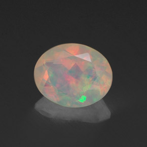 Ópalo multicolor natural de 0,83 ct, transparente, transparente / translúcido