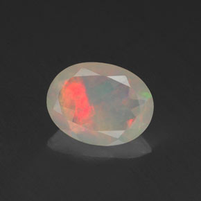 Ópalo multicolor natural de 0,64 ct, corte óvalo, transparente