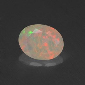 Ópalo multicolor natural de 0,76 ct, transparente, transparente / translúcido