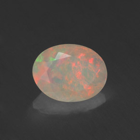 Ópalo multicolor natural de 0,76 ct, transparente, transparente / translúcido