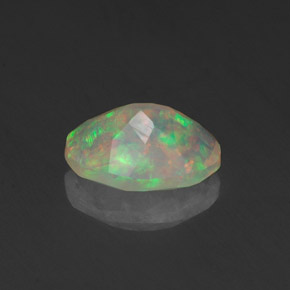 Ópalo multicolor natural de 0,74 ct, corte óvalo, transparente