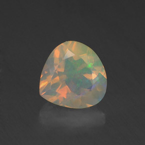 Ópalo multicolor natural de 0,84 ct, en forma de pera, transparente