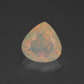 Ópalo multicolor natural de 0,67 ct, en forma de pera, transparente