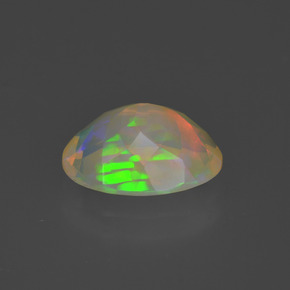 Ópalo multicolor natural de 1,47 ct, corte óvalo, transparente