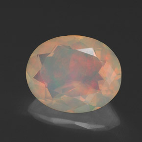 Ópalo multicolor natural de 1,54 ct, corte óvalo, transparente
