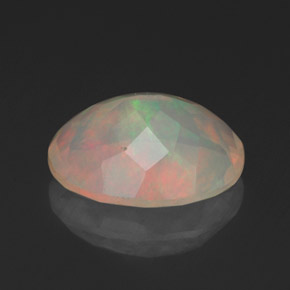Ópalo multicolor natural de 1,54 ct, corte óvalo, transparente