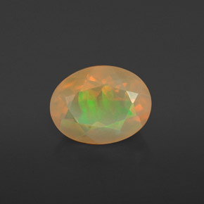 Ópalo multicolor natural de 1,28 ct, corte óvalo, translúcido