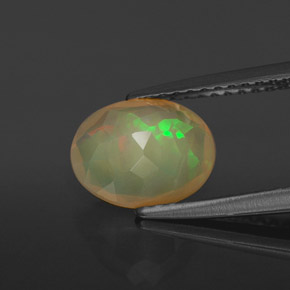 Ópalo multicolor natural de 1,28 ct, corte óvalo, translúcido