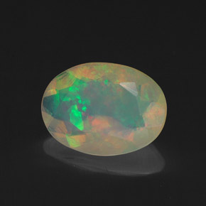 Ópalo multicolor natural de 1,25 ct, corte óvalo, transparente
